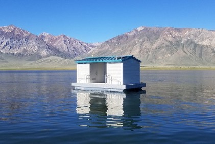DBW floating restroom at Lake Crowley. Photo from Division of Boating and Waterways.